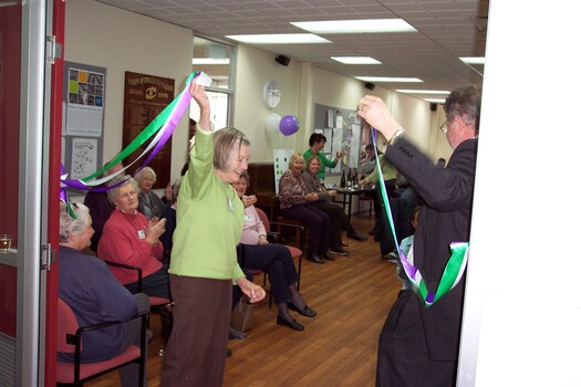 Joan Backwell and Brian Hardy cut the ribbon