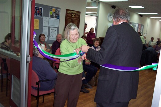 Joan Backwell and Brian Hardy cut the ribbon