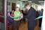 Joan Backwell and Brian Hardy cut the ribbon