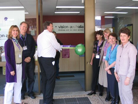 Staff and Day Centre clients at branch launch party for Vision Australia