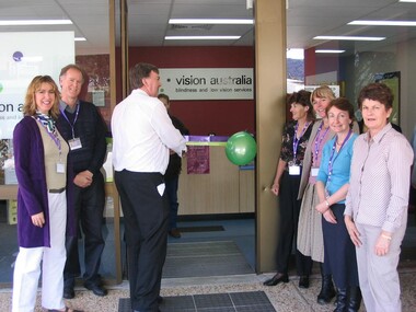 Staff and Day Centre clients at branch launch party for Vision Australia