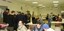 Staff at branch launch party for Vision Australia (Robert Toseland in beige jacket in foreground)