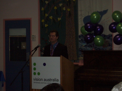 Andrew Furlong at the podium for the brand launch