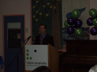 Andrew Furlong at the podium for the brand launch