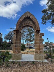 Stone archway situated in garden at Enfield