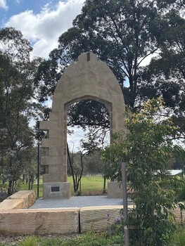 Stone archway situated in garden at Enfield