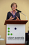 Julie McCallum at the podium