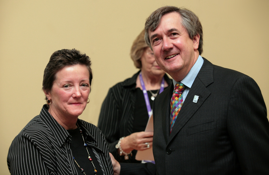 Awarded volunteer with CEO Gerard Menses
