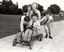 Boys playing with a billy cart at Burwood