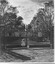 Little girl at gate of St Kilda Road