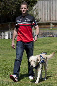 Will Davison walking with SEDA dog Davo 