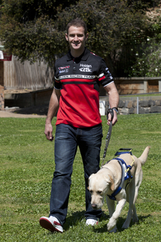 Will Davison walking with SEDA dog Davo 