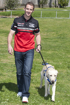 Will Davison walking with SEDA dog Davo 