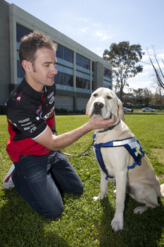 Will Davison with SEDA dog Davo at Kooyong