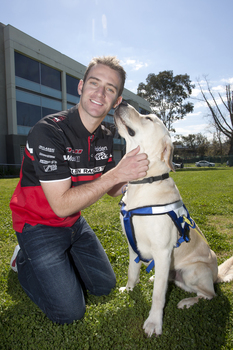 Will Davison with SEDA dog Davo at Kooyong