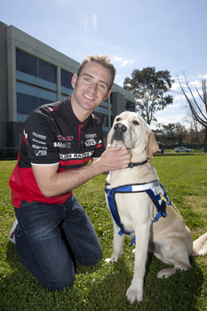 Will Davison with SEDA dog Davo at Kooyong