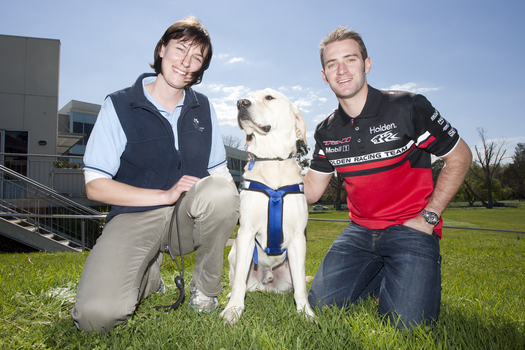 Will Davison with SEDA dog Davo and dog trainer