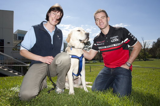 Will Davison with SEDA dog Davo and dog trainer