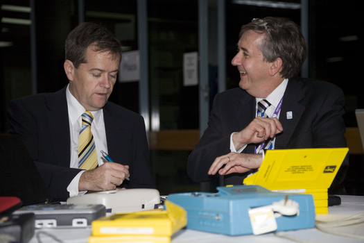 Bill Shorten and Gerard Menses with audio materials