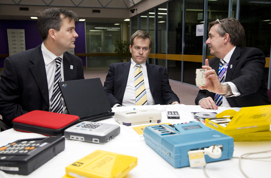 Chris Edwards, Bill Shorten and Gerard Menses with audio materials