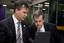 Chris Edwards and Bill Shorten view a PC