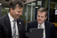 Chris Edwards and Bill Shorten view a PC