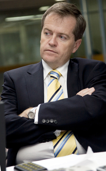 Bill Shorten listens in the Atrium