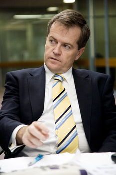 Bill Shorten listens in the Atrium