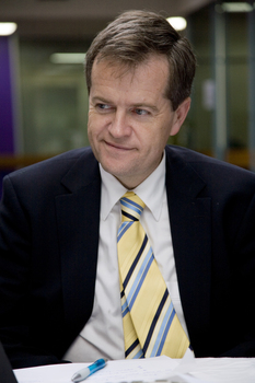 Bill Shorten listens in the Atrium