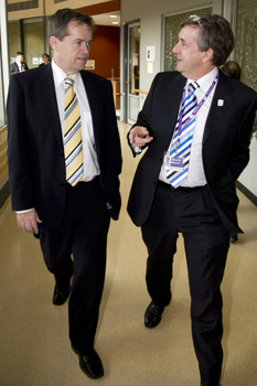 Bill Shorten and Gerard Menses walking to reception