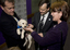 Bill Shorten holding a SEDA puppy