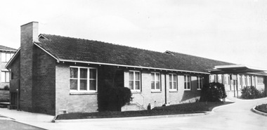 Corner view of nursing home showing driveway