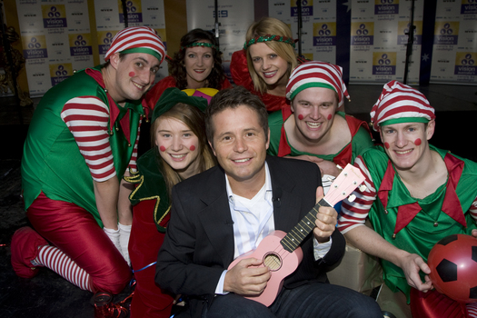 Channel 9 weather presenter Steve Jacobs with elves