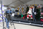 Ready for camera - Santa, elves and Steve Jacobs