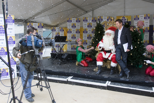 Ready for camera - Santa, elves and Steve Jacobs