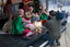 Camera person filming the elves wrapping presents
