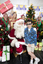 Sam DeShayes with Santa and the elves