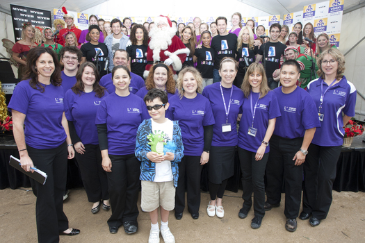 Sam DeShayes, Vision Australia crew and entertainers at the launch