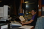 Possibly Tina Muncaster in studios, as Carlos is unwilling for photos