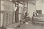 Inside mat workshop with workers standing on benches - not used in book
