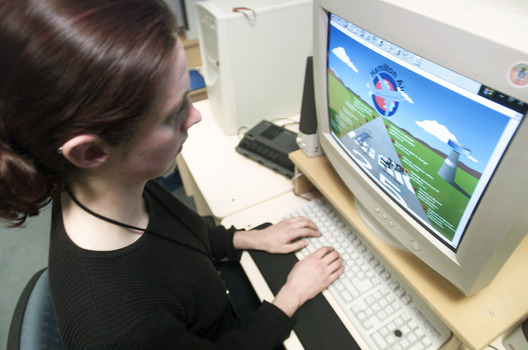 Woman using a computer at RVIB College