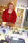 Woman with showcase of equipment in Assist shop