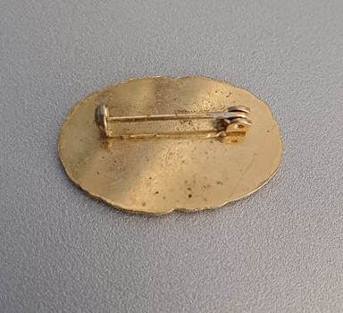 Rear side of Member badge for Victorian Blind Bowls Association 