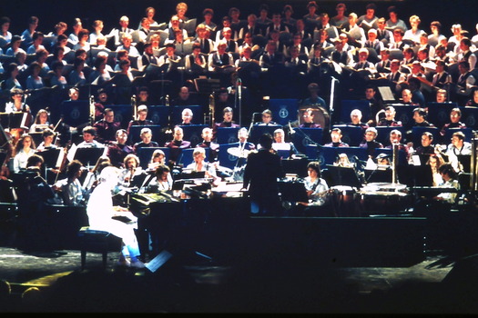 Simon Gallaher on piano on stage