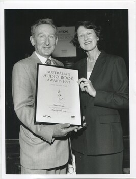 James Wright with Elizabeth Wood and award