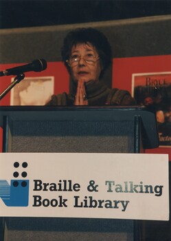 Presenter at the podium for the awards