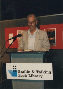 Presenter at the podium for the awards
