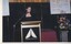 Rebecca Macauley reads from the podium