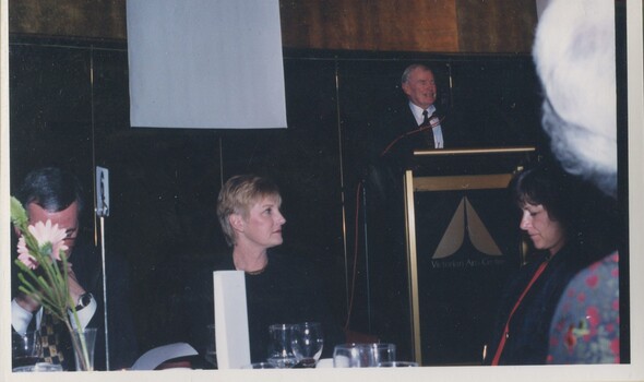 Bib Stillwell speaking at the podium
