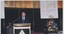 Unknown male at podium